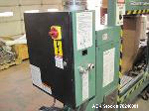 Used Signode Strapping Machine, Model SP710.  36" x 36" box, approximately 12 rolls of strapping, 220/3 phase.