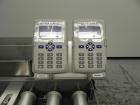 Unused- ATS (Felins) Model US-2100 Wide Format Banding Machine. Machine is capable of speeds up to 25-30 bandings per minute. Uses a 