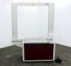 Used Dynaric Automatic Model DF-11 Bottom Seal Strapping Machine.Capable of 1.6 second cycle time, and up to 37 straps per minute. has an 'Arch' opening of 44.5