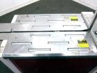 Used Dynaric Automatic Model DF-11 Bottom Seal Strapping Machine.Capable of 1.6 second cycle time, and up to 37 straps per minute. has an 'Arch' opening of 44.5