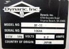 Used Dynaric Automatic Model DF-11 Bottom Seal Strapping Machine.Capable of 1.6 second cycle time, and up to 37 straps per minute. has an 'Arch' opening of 44.5