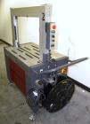Used Ovalstrapping Modular Strapping Machine, Series JO, Carbon Steel. Approximately 52 straps per minute. Plastic strap size 6, 9, 12, and 15mm, heat seal.1/60/115 volt.Arch is 19