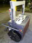 Used Ovalstrapping Modular Strapping Machine, Series JO, Carbon Steel. Approximately 52 straps per minute. Plastic strap size 6, 9, 12, and 15mm, heat seal.1/60/115 volt.Arch is 19