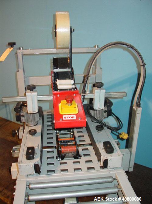 Used 3M Top and Bottom Case Taper, Model 120A3, Type 19700, Carbon Steel. Up to 25 cases per minute, minimum case size 4.75" wide x 4.75" high x 6" long, maximum case size 20" wide x 20" high x unlim...
