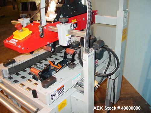 Used 3M Top and Bottom Case Taper, Model 120A3, Type 19700, Carbon Steel. Up to 25 cases per minute, minimum case size 4.75" wide x 4.75" high x 6" long, maximum case size 20" wide x 20" high x unlim...