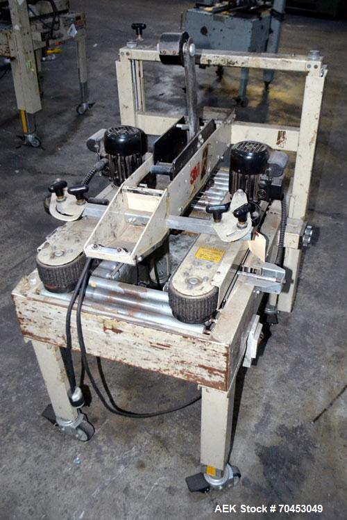 Used 3M 12A-18600 Semi-Auto Adjustable Top Case Taper capable of speeds up to 27 cpm depending on application and operator dexterity. Case size range of:  6" - unlimited length x 4 1/2" - 20" wide x ...