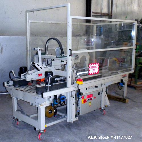 Used 3M Top and Bottom Case Taper, Model 12RF, Type 18700, Carbon Steel. Up to 8 cases per minute. Case size range: Length 10’’ to 24’’, Width 8’’ to 19-1/2’’, Height 6’’ to 20’’. Tape width 3". Moto...