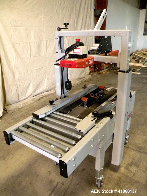 Used 3M-Matic Top And Bottom Adjustable Case Sealer, Model 200A, Type 29200, Carbon Steel. Up to 40 cases per minute, minimum case size 6" wide x 4.75" high x 6" long, maximum case size 21.5" wide x ...