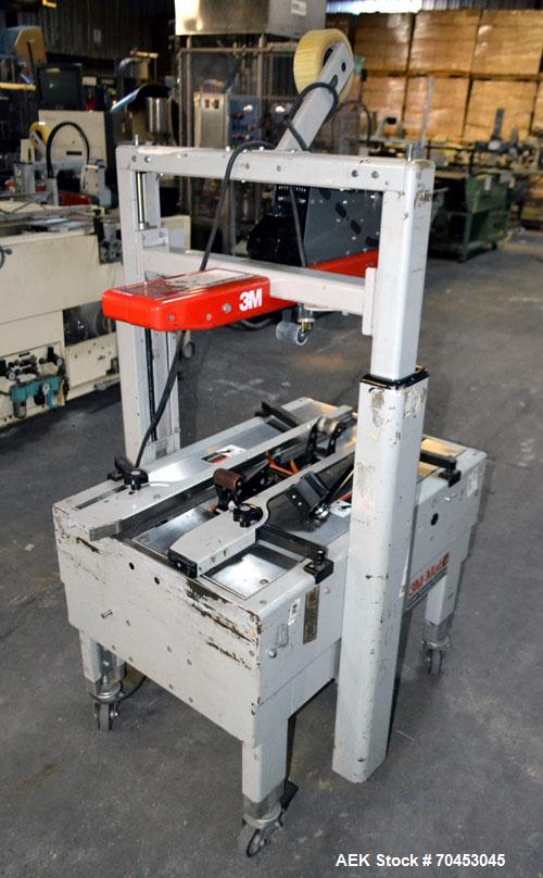 Used 3M-Matic Top & Bottom Adjustable Case Sealer, Model 200A, Type 19000, Carbon Steel. Up to 40 cases per minute, minimum case size 6" wide x 4.75" high x 6" long, maximum case size 21.5" wide x 24...