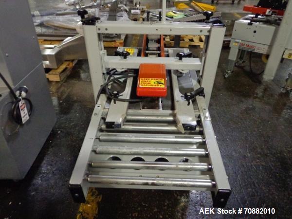 Used- 3M Model 200A, Type 19000 Top and Bottom Adjustable Case Sealer. Up to 40 cases per minute, minimum case size 6" wide ...