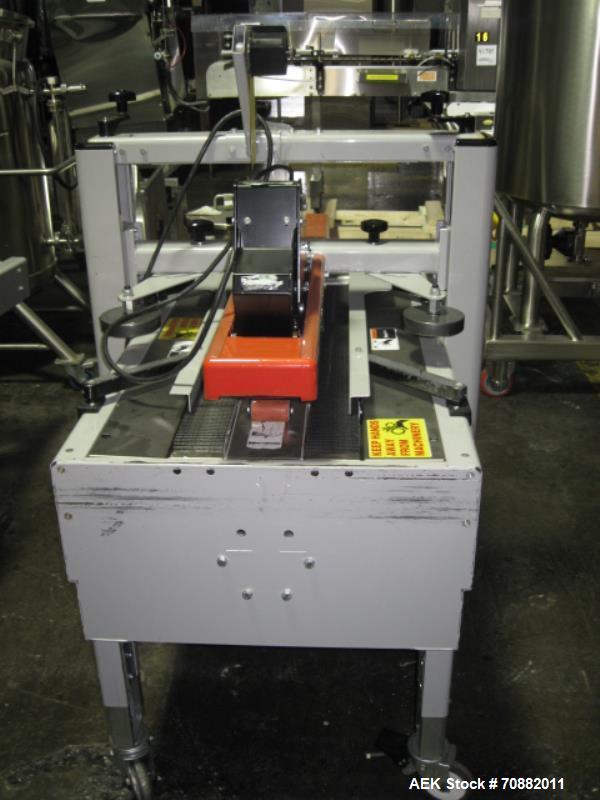 Used 3M Model 200A, Type 29200 Top and Bottom Adjustable Case Sealer. Up to 40 cases per minute, minimum case size 6" wide x 4.75" high x 6"' long, maximum case size 21.5" wide x 24.5" to 28.5" high ...