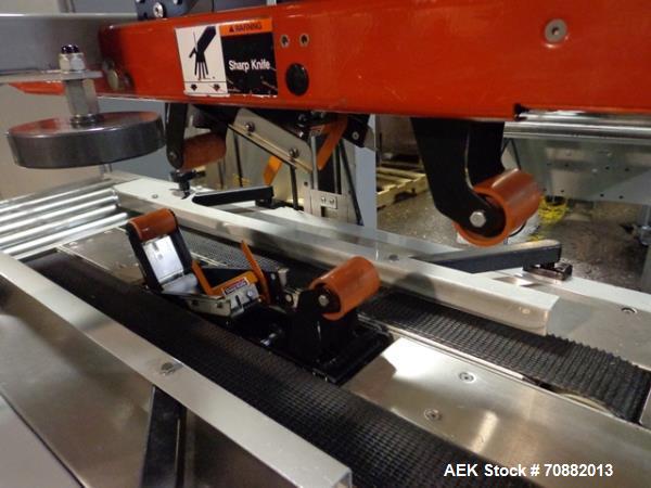 Used 3M Model 200A, Type 19000 Case Sealer. Top and bottom heads. Capable of speeds up to to 40 cases per minute, minimum case size 6" wide x 4.75" high x 6"' long, maximum case size 21.5" wide x 24....