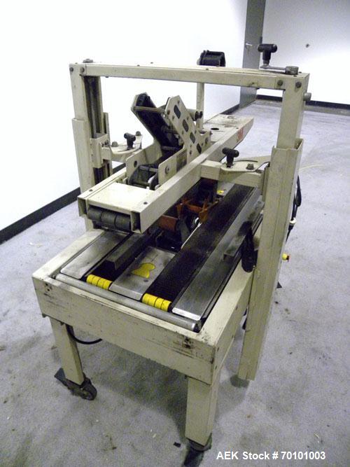 Used 3M-Matic Top And Bottom Adjustable Case Sealer, Model 22A, Type 28600, Carbon Steel. Up to 27 cases per minute. Case size range Length 6’’ to unlimited, Width 6’’ to 20’’, Height 4-3/4’’ to 20’’...