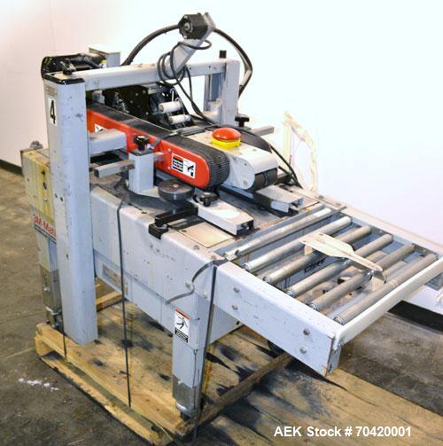 Used 3M-Matic Top and Bottom Adjustable Case Sealer, Model 700A, Type 29200, Carbon Steel. Up to 30 cases per minute. Case size range:  length 6’’ to unlimited, width 6’’ to 21-1/2’’, height 4-3/4’’ ...