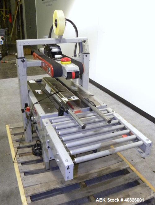 Used 3M-Matic Top And Bottom Random Case Sealer, Model 700R, Type 39600, Carbon Steel. Up to 15 cases per minute, minimum case size 6" wide x 4.75" high x 6" long, maximum case size 21.5" wide x 24.5...