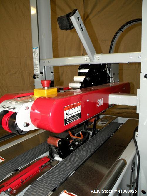 Used 3M-Matic Top and Bottom Random Case Sealer, Model 700R, Type 39600, Carbon Steel. Up to 15 cases per minute, minimum case size 6" wide x 4.75" high x 6" long, maximum case size 21.5" wide x 24.5...