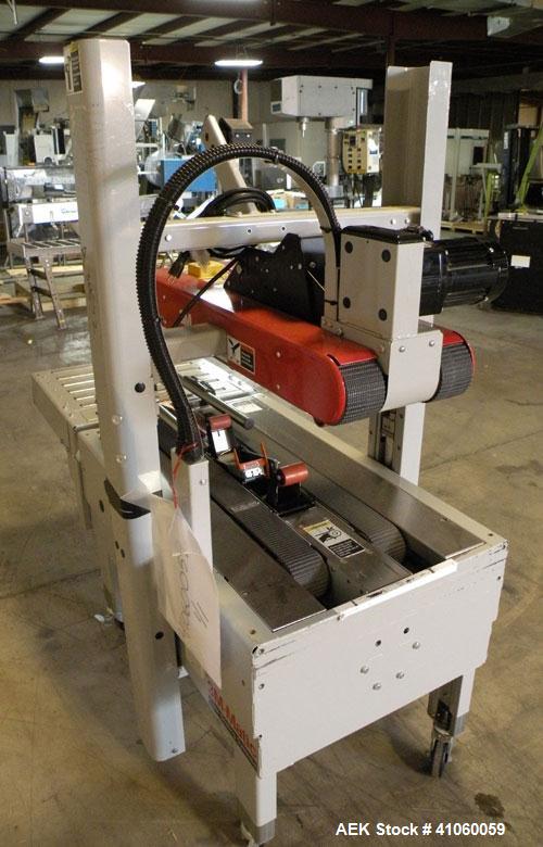 Used 3M-Matic Top And Bottom Random Case Sealer, Model 700R, Type 39600, Carbon Steel. Up to 15 cases per minute, minimum case size 6" wide x 4.75" high x 6" long, maximum case size 21.5" wide x 24.5...