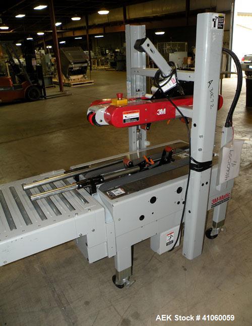 Used 3M-Matic Top And Bottom Random Case Sealer, Model 700R, Type 39600, Carbon Steel. Up to 15 cases per minute, minimum case size 6" wide x 4.75" high x 6" long, maximum case size 21.5" wide x 24.5...