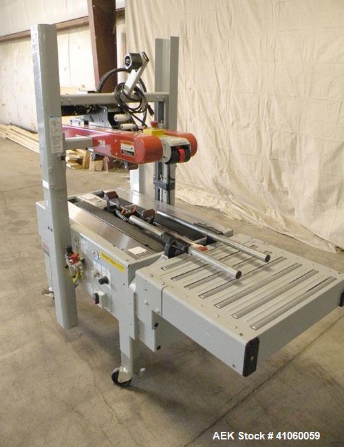 Used 3M-Matic Top And Bottom Random Case Sealer, Model 700R, Type 39600, Carbon Steel. Up to 15 cases per minute, minimum case size 6" wide x 4.75" high x 6" long, maximum case size 21.5" wide x 24.5...