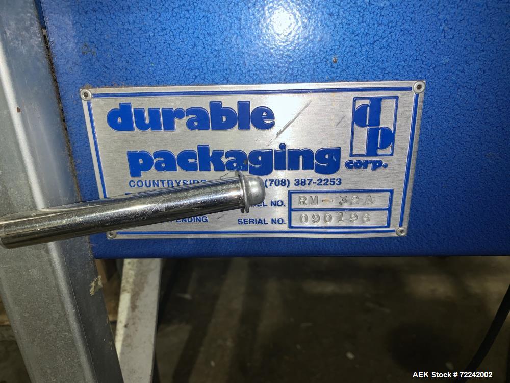 Used Durable Packaging Model RM-32A Top and Bottom Only Case Sealer. Case size range: 4-3/4" to infinite (length) x 4-3/4" to 20" (width) x 3-1/4" to 20" (height).  Maximum case weight 90 lbs 40 kg. ...