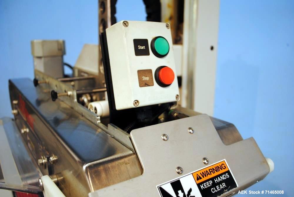Used Belcor (Wexxar) Model 185 automatic random top case taper sealer. Capable of speeds up to 20 cases per minute. Has a case size range: 8" - unlimited length, 6" to 20" width,  4-1/2" - 19-1/2" he...