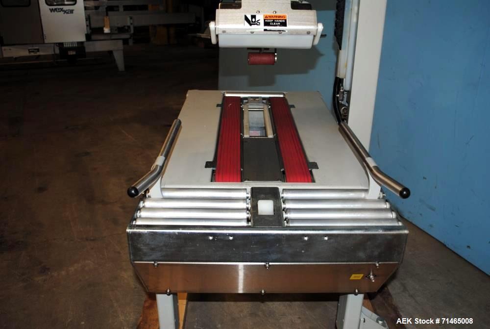 Used Belcor (Wexxar) Model 185 automatic random top case taper sealer. Capable of speeds up to 20 cases per minute. Has a case size range: 8" - unlimited length, 6" to 20" width,  4-1/2" - 19-1/2" he...