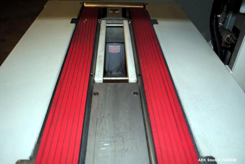 Used Belcor (Wexxar) Model 185 automatic random top case taper sealer. Capable of speeds up to 20 cases per minute. Has a case size range: 8" - unlimited length, 6" to 20" width,  4-1/2" - 19-1/2" he...