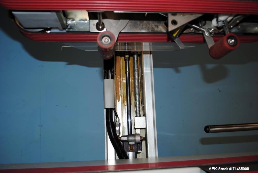 Used Belcor (Wexxar) Model 185 automatic random top case taper sealer. Capable of speeds up to 20 cases per minute. Has a case size range: 8" - unlimited length, 6" to 20" width,  4-1/2" - 19-1/2" he...