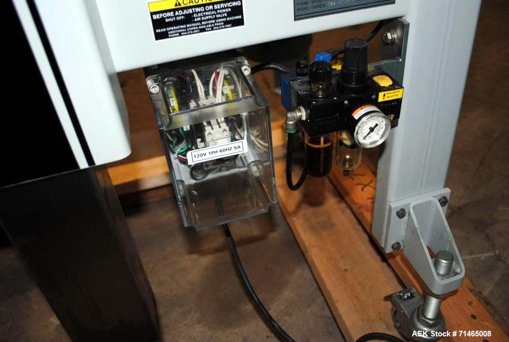 Used Belcor (Wexxar) Model 185 automatic random top case taper sealer. Capable of speeds up to 20 cases per minute. Has a case size range: 8" - unlimited length, 6" to 20" width,  4-1/2" - 19-1/2" he...