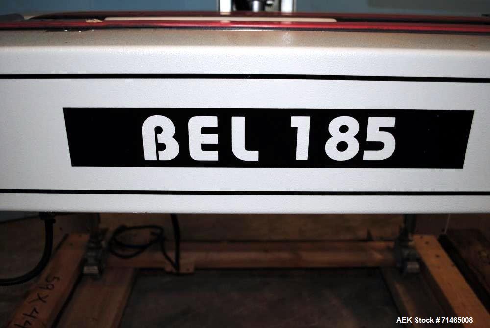 Used Belcor (Wexxar) Model 185 automatic random top case taper sealer. Capable of speeds up to 20 cases per minute. Has a case size range: 8" - unlimited length, 6" to 20" width,  4-1/2" - 19-1/2" he...