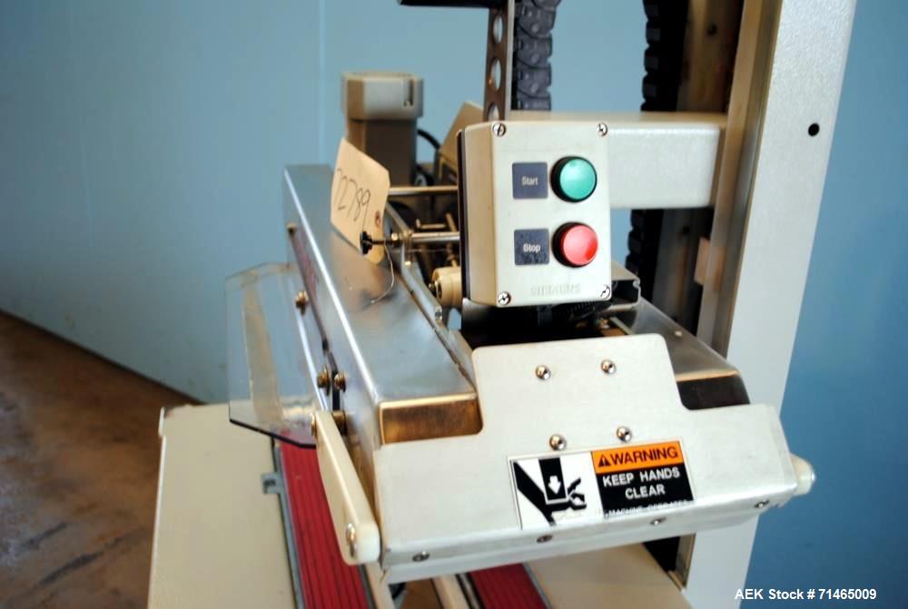 Used Belcor (Wexxar) Model 185 automatic random top case taper sealer. Capable of speeds up to 20 cases per minute. Has a case size range: 8" - unlimited length, 6" to 20" width,  4-1/2" - 19-1/2" he...