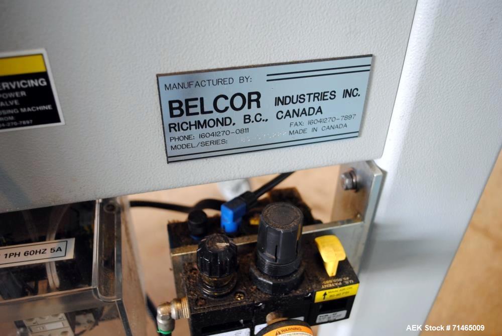 Used Belcor (Wexxar) Model 185 automatic random top case taper sealer. Capable of speeds up to 20 cases per minute. Has a case size range: 8" - unlimited length, 6" to 20" width,  4-1/2" - 19-1/2" he...