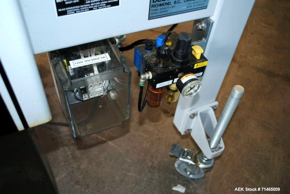 Used Belcor (Wexxar) Model 185 automatic random top case taper sealer. Capable of speeds up to 20 cases per minute. Has a case size range: 8" - unlimited length, 6" to 20" width,  4-1/2" - 19-1/2" he...