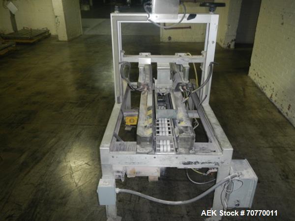 Used Belcor case taper, semi-automatic, Model 252, top and bottom taper with bottom tape head only, case capacity 8" to 24" long x 6" to 16.5" wide x 3" to 16" high, serial # 252-7286