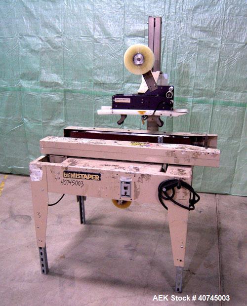 Used Bemis Semi-Automatic Uniform Top /Bottom Case Taper, Model 1018SA, carbon steel. Capable of speeds up to 28 CPM. Has side belt transfers and a case size range: length 4-1/2" to unlimited, height...