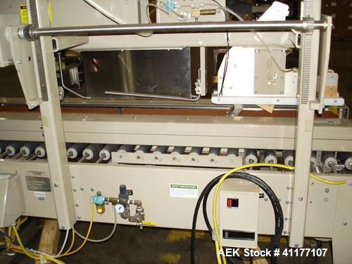 Used Bemis Case Sealer, Model 1022-SA00, Carbon Steel. Rated up to 28 cases per minute. Case size range: 6" - 24" long x 4-1/2" - 20" wide x 4-1/2" - 20" high. Fully auto side belt uniform case taper...