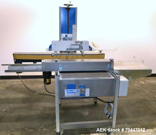 Used Durable Packaging Top & Bottom Case Sealer, Model RM-32S. Case size range: length 4-3/4" to infinite, width 4-3/4" to 20", and height 3-1/4" to 20". Maximum case weight 90 lbs [40 kg]. Tape Appl...