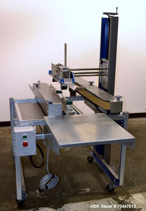 Used Durable Packaging Top & Bottom Case Sealer, Model RM-32S. Case size range: length 4-3/4" to infinite, width 4-3/4" to 20", and height 3-1/4" to 20". Maximum case weight 90 lbs [40 kg]. Tape Appl...