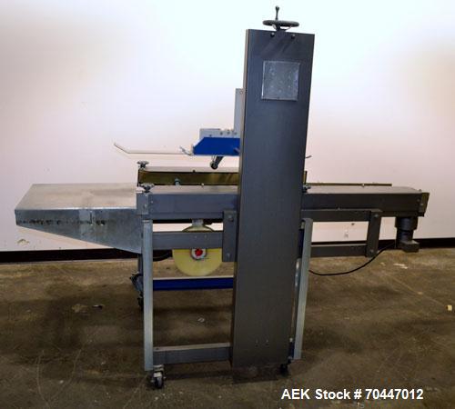 Used Durable Packaging Top & Bottom Case Sealer, Model RM-32S. Case size range: length 4-3/4" to infinite, width 4-3/4" to 20", and height 3-1/4" to 20". Maximum case weight 90 lbs [40 kg]. Tape Appl...