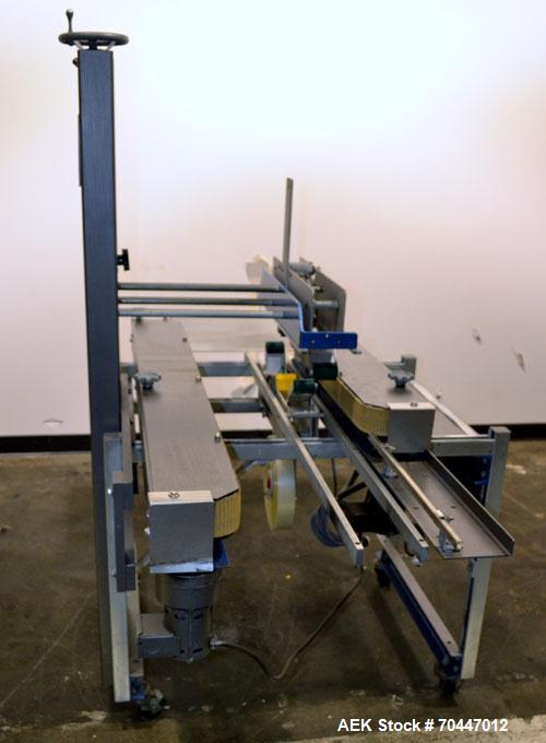 Used Durable Packaging Top & Bottom Case Sealer, Model RM-32S. Case size range: length 4-3/4" to infinite, width 4-3/4" to 20", and height 3-1/4" to 20". Maximum case weight 90 lbs [40 kg]. Tape Appl...
