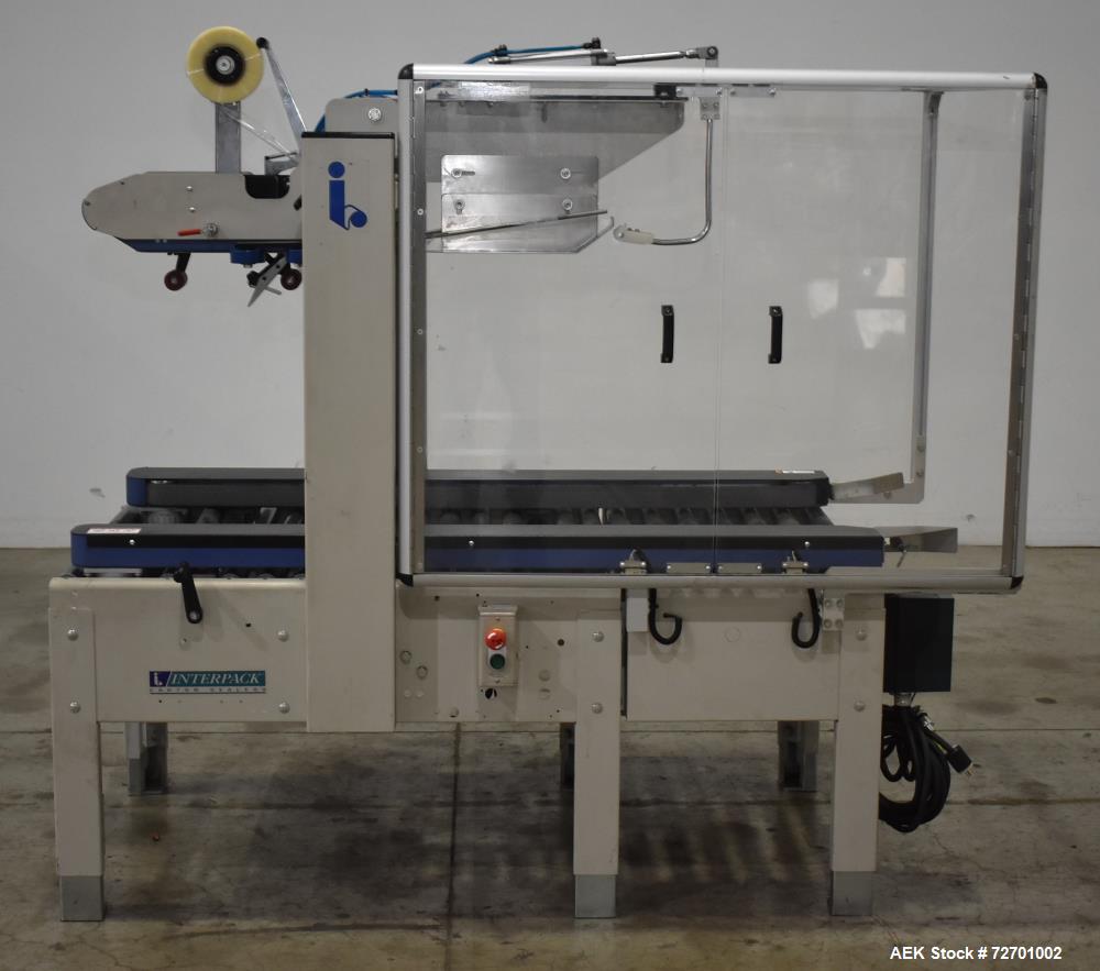 Used Interpack UA 262024-SB Uniform Automatic Case Sealer. Capable of up to 12 cases per minute. Size range of 6 to 26" long x 3.5 to 20" wide x 3.5 to 24" tall. 2" Wide top tape head. Side belt driv...