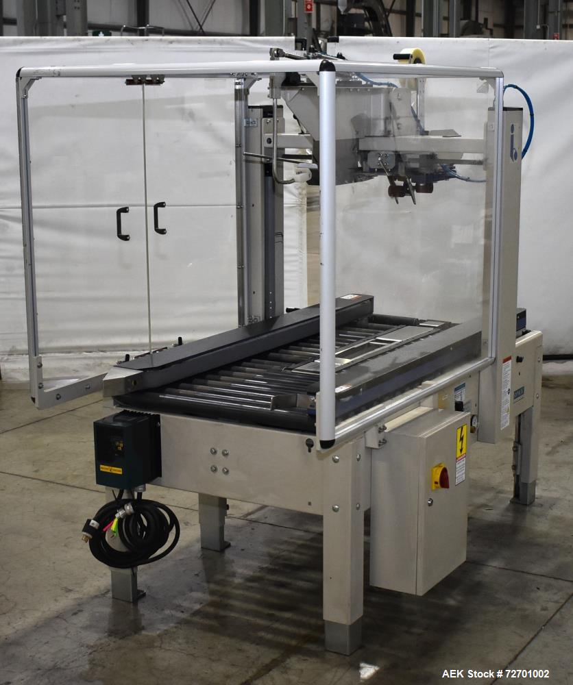 Used- Interpack UA 262024-SB Uniform Automatic Case Sealer. Capable of up to 12 cases per minute. Size range of 6 to 26" lon...
