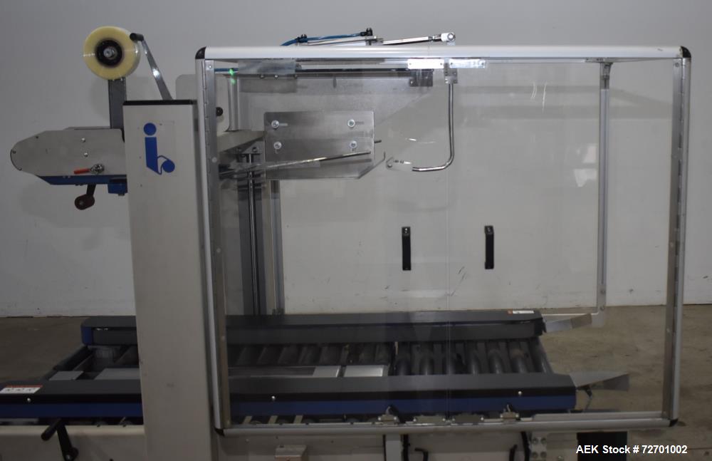 Used- Interpack UA 262024-SB Uniform Automatic Case Sealer. Capable of up to 12 cases per minute. Size range of 6 to 26" lon...