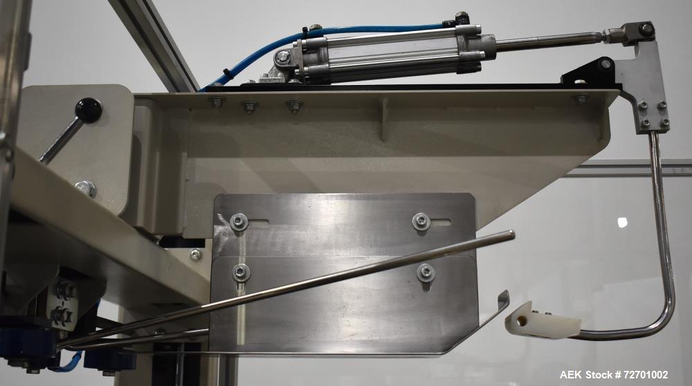 Used Interpack UA 262024-SB Uniform Automatic Case Sealer. Capable of up to 12 cases per minute. Size range of 6 to 26" long x 3.5 to 20" wide x 3.5 to 24" tall. 2" Wide top tape head. Side belt driv...