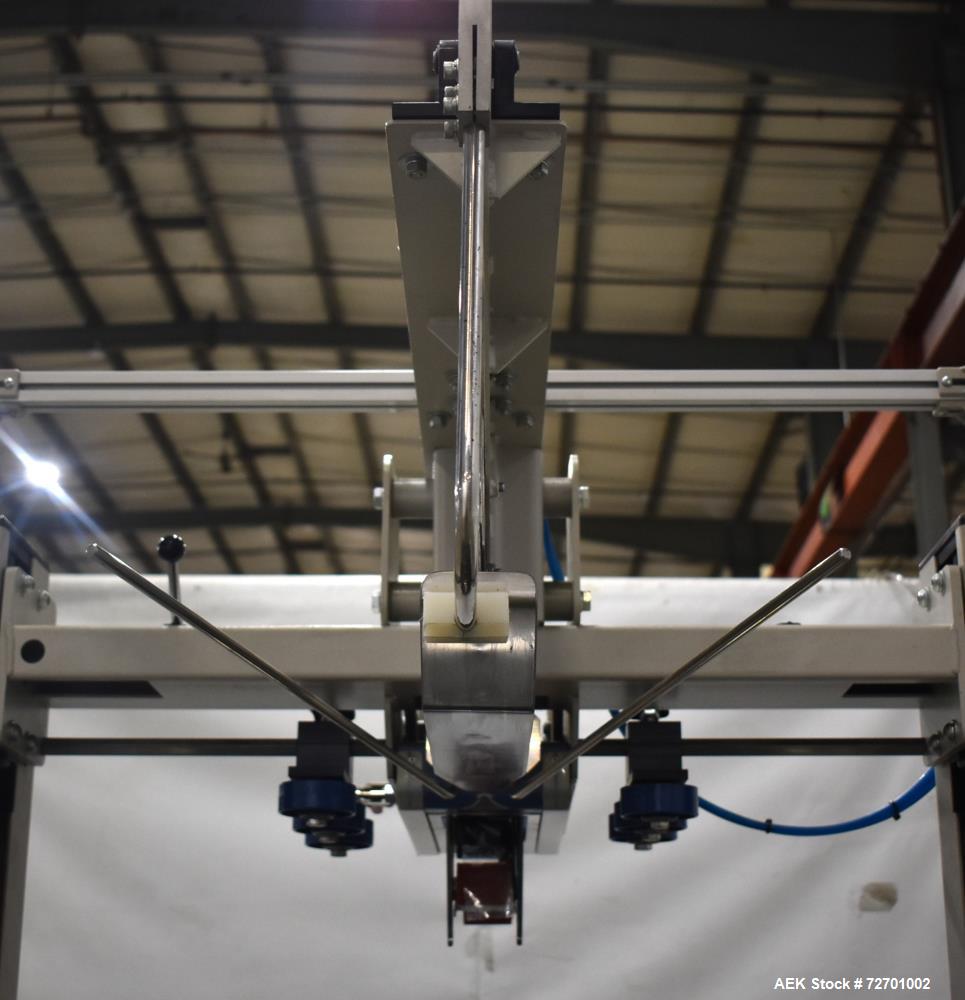 Used Interpack UA 262024-SB Uniform Automatic Case Sealer. Capable of up to 12 cases per minute. Size range of 6 to 26" long x 3.5 to 20" wide x 3.5 to 24" tall. 2" Wide top tape head. Side belt driv...