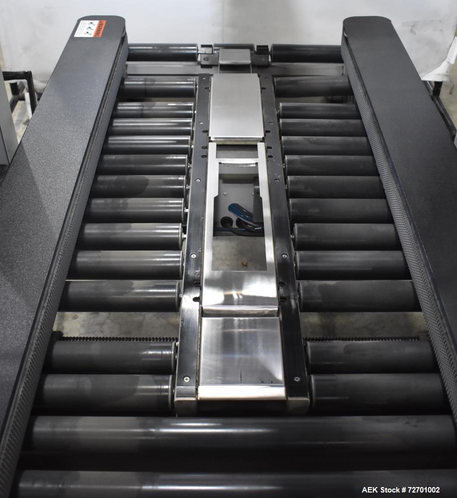 Used Interpack UA 262024-SB Uniform Automatic Case Sealer. Capable of up to 12 cases per minute. Size range of 6 to 26" long x 3.5 to 20" wide x 3.5 to 24" tall. 2" Wide top tape head. Side belt driv...