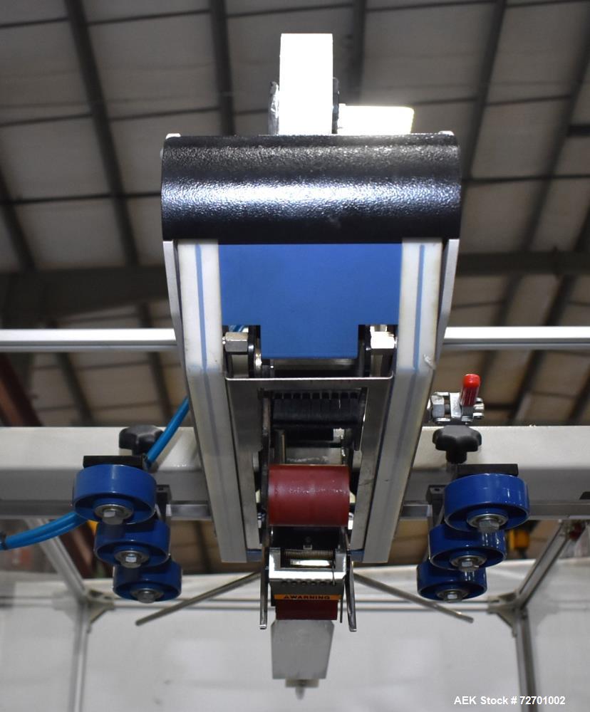 Used Interpack UA 262024-SB Uniform Automatic Case Sealer. Capable of up to 12 cases per minute. Size range of 6 to 26" long x 3.5 to 20" wide x 3.5 to 24" tall. 2" Wide top tape head. Side belt driv...