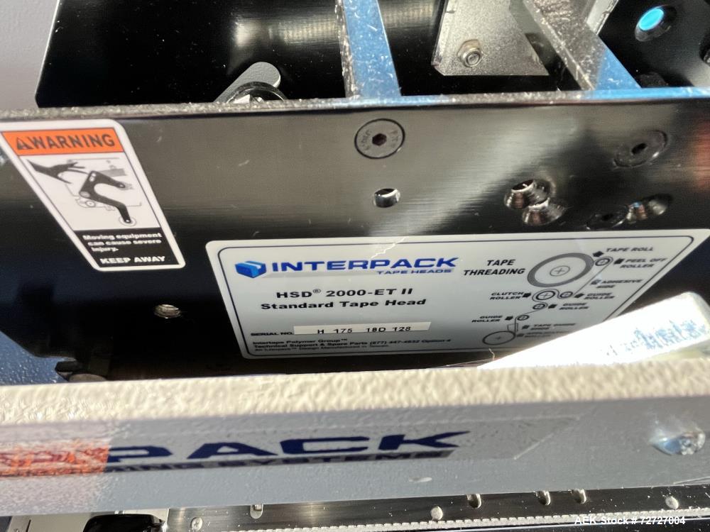Used Interpack Top and Bottom Tape Case Sealer, Model USA20-SB-BO. Belt speed 82 feet per minute. Carton weight capacity up to 85lbs. Interpack HSD 2000-ET II standard tape head. Serial# TM 094 18B 0...