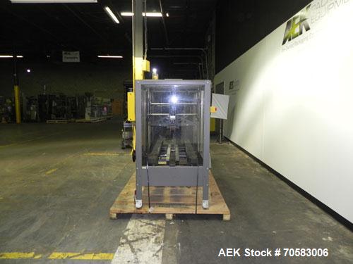 Used Little David (Loveshaw) Model LD-16SB Case Taper. Unit is capable of speeds up to 60 feet per minute. Is currently set up with top tape head only (has provisions for bottom tape head). Has a cas...