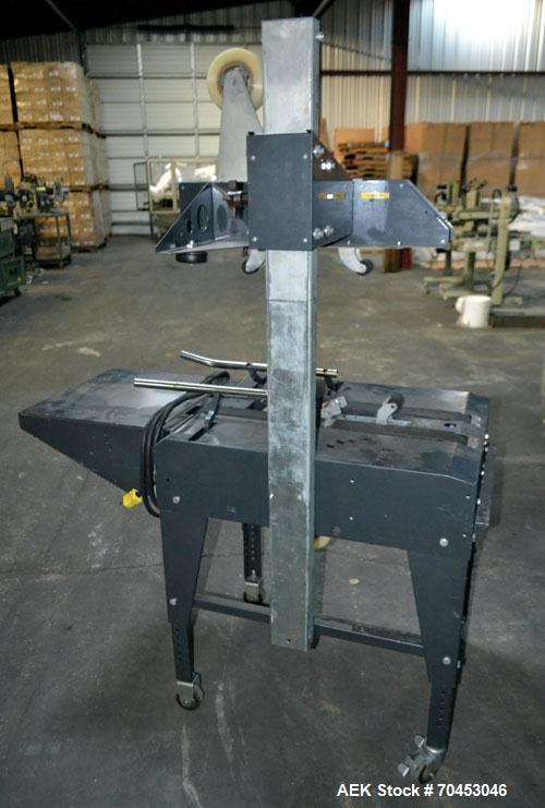 Used Little David Model LD3E Top & Bottom Tape Case Sealer. Capable of speeds up to 72' per minute. Can handle a case size range of: (width) 4-1/2" (114mm) to 24" (610mm). Uses pressure sensitive tap...